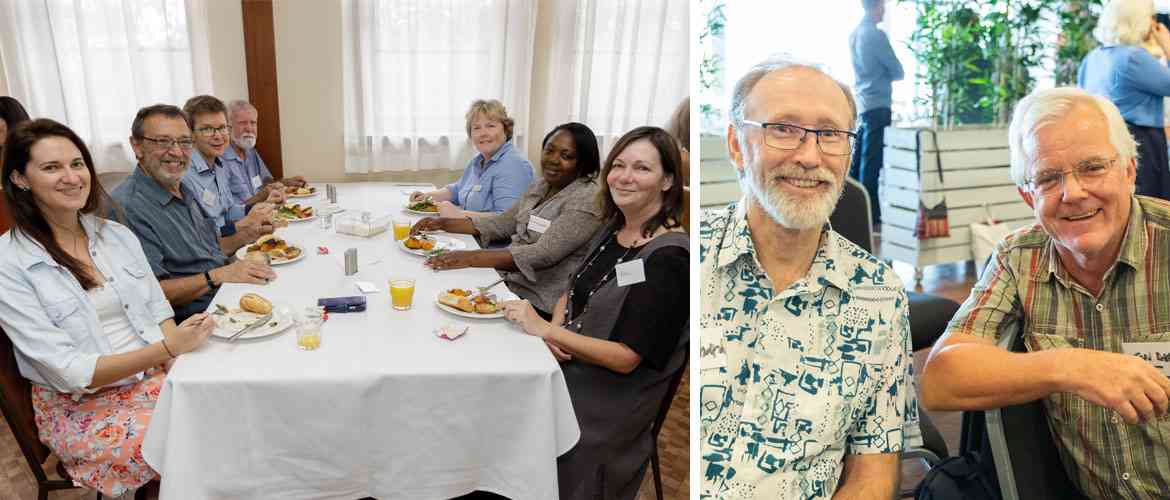 Left: a group of people around a table having lunch, Right: two smiling men